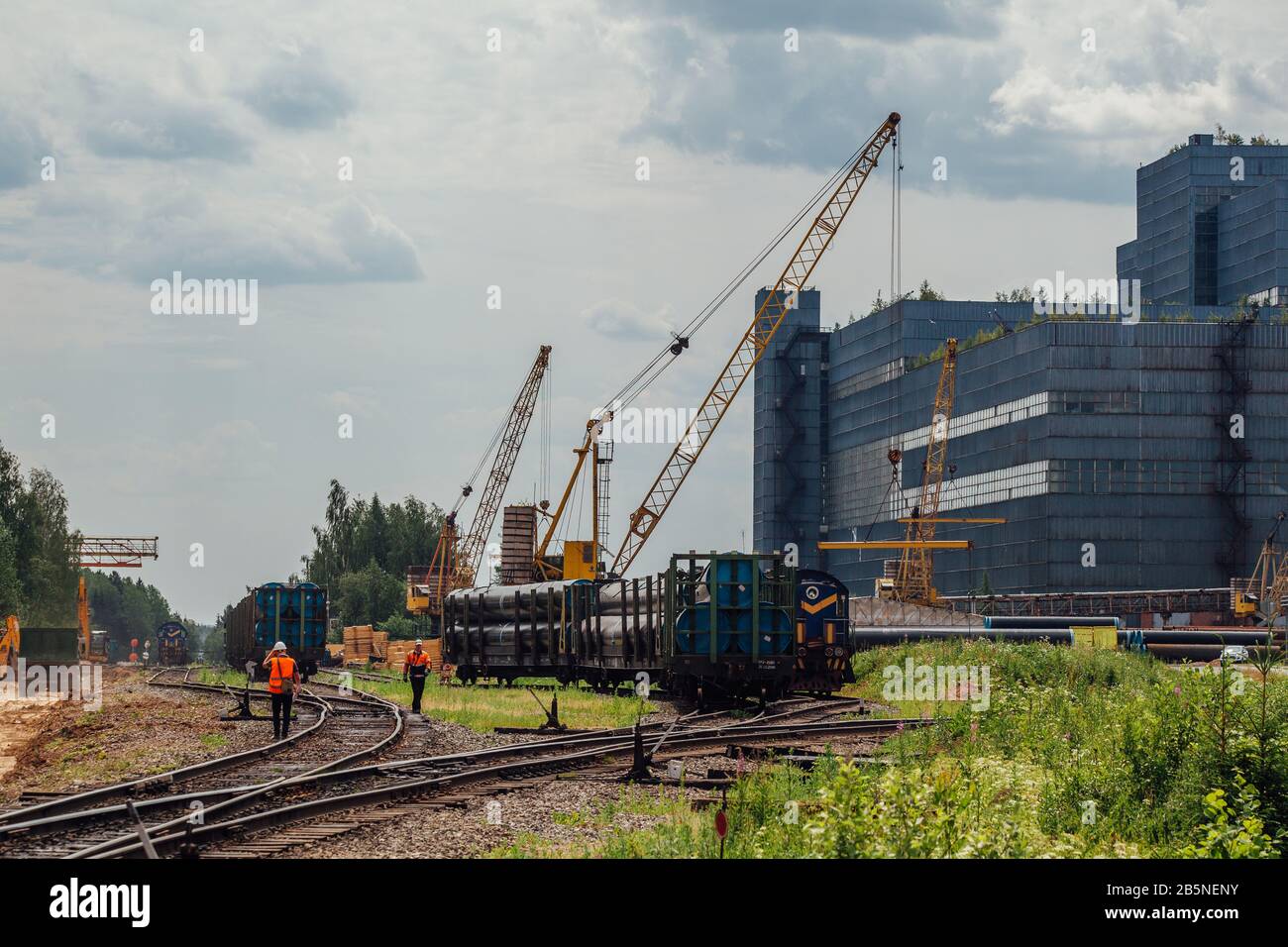 Freight trains with cargo on railroad junction. Stock Photo