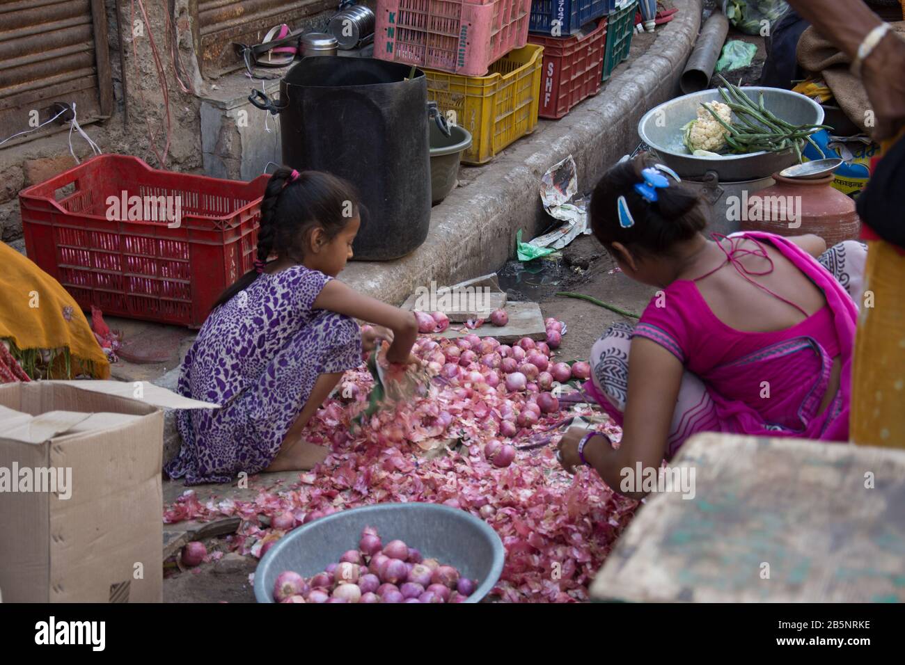Indian woman peeling of an onion hi-res stock photography and images ...