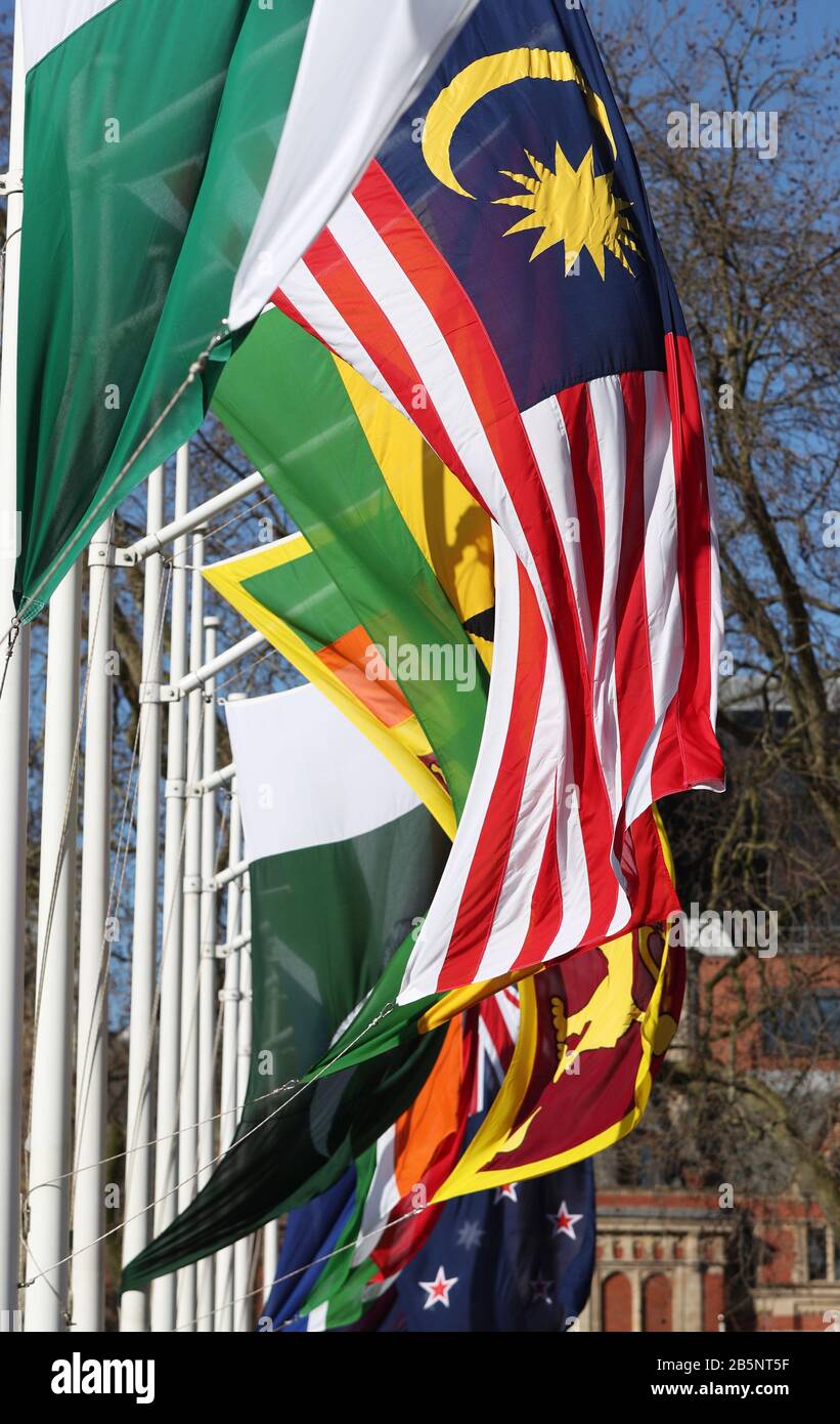 General view of flags of various Commonwealth nations fly around the perimeter of Parliament Square, London. Stock Photo