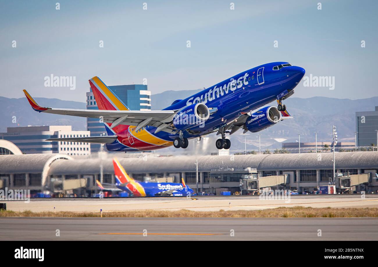 Southwest Airlines passanger jet taking off at John Wayne Airport Stock