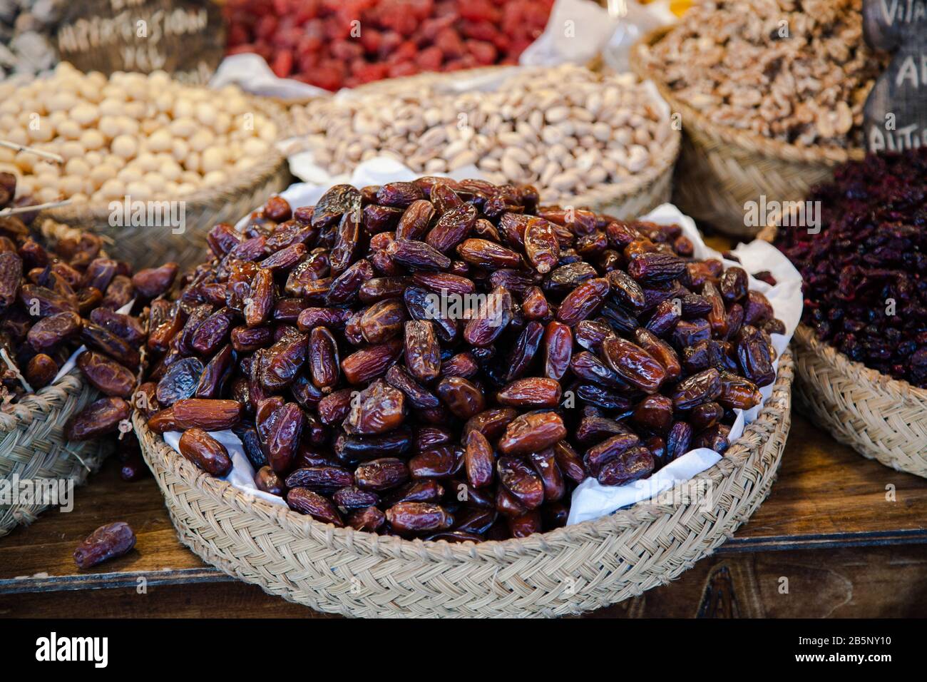 Medjool dates in a wicker basket stock photo Stock Photo