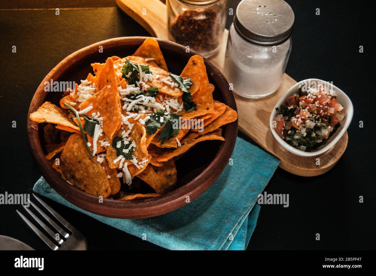 Bowl of nachos with oaxaca cheese Stock Photo Alamy
