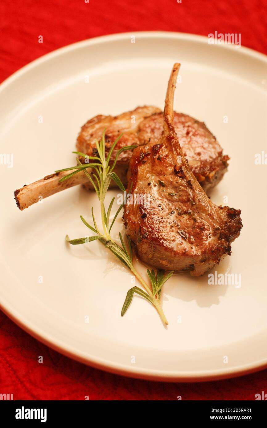Lamb Chops with Rosemary Garnish Stock Photo Alamy