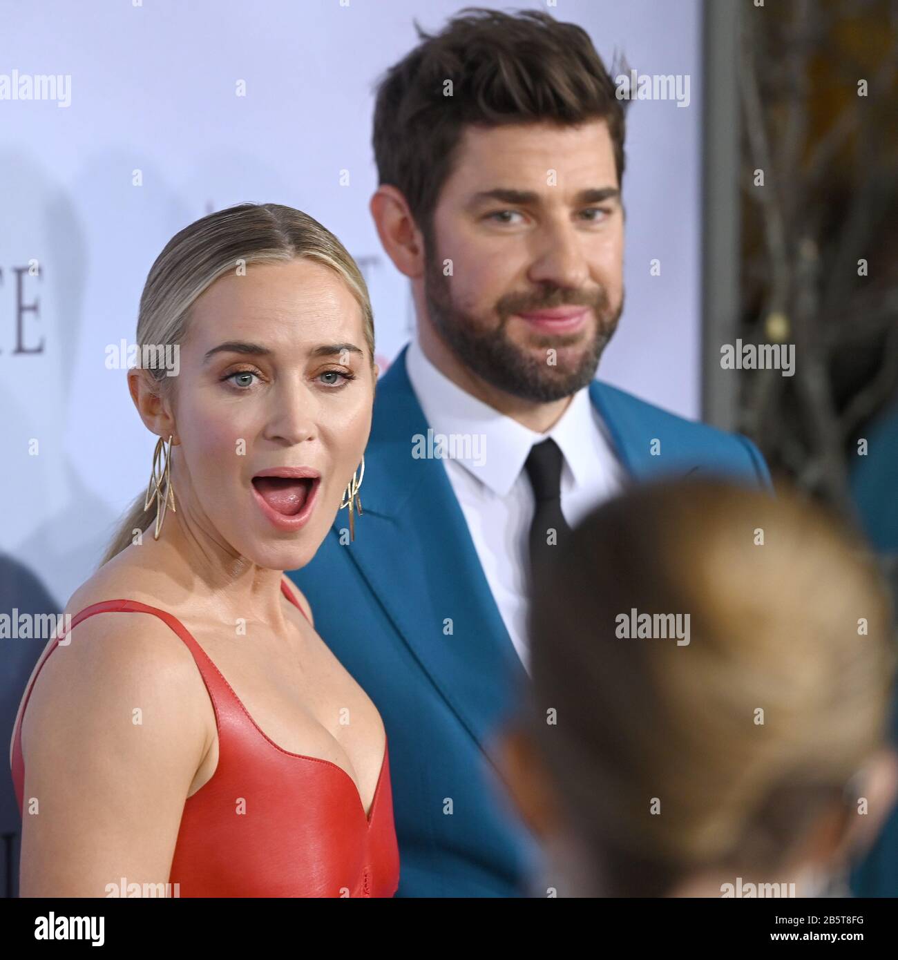 blue suit with red dress