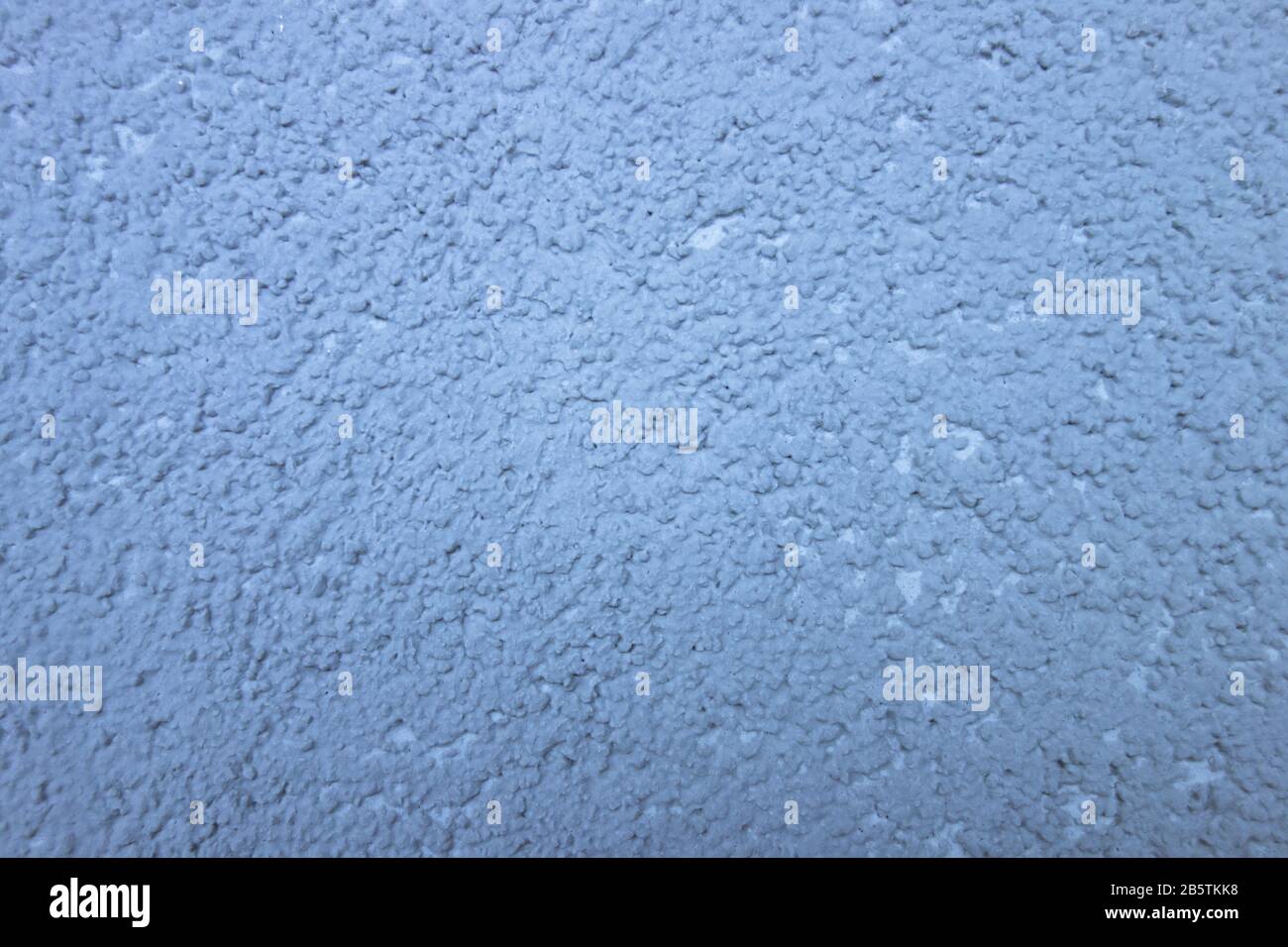 Blue textured background. Big grained grunge backdrop wall. Design pattern template with copy space Stock Photo