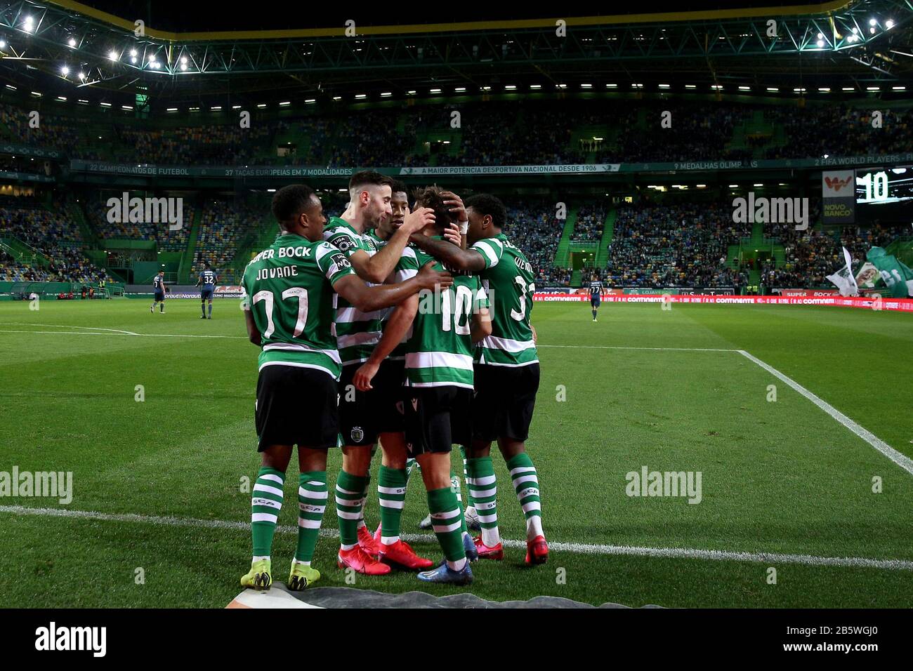 Lisbon. 8th Mar, 2020. Players of Sporting CP celebrate after scoring during the Portuguese First League soccer match between Sporting CP and Desportivo das Aves in Lisbon, Portugal on March 8, 2020. Credit: Pedro Fiuza/Xinhua/Alamy Live News Stock Photo