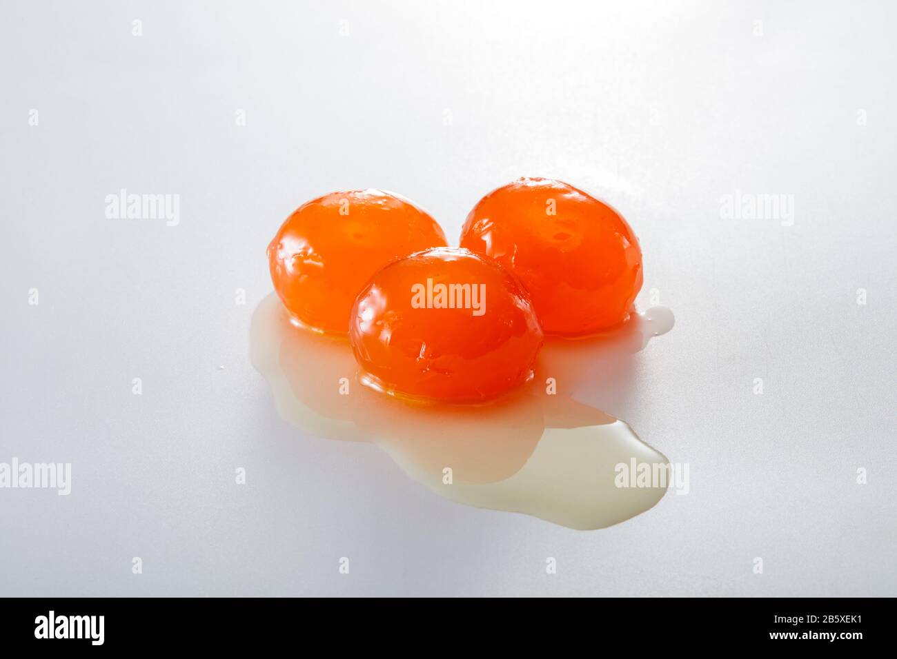 Three salted duck egg yolks closeup Stock Photo - Alamy