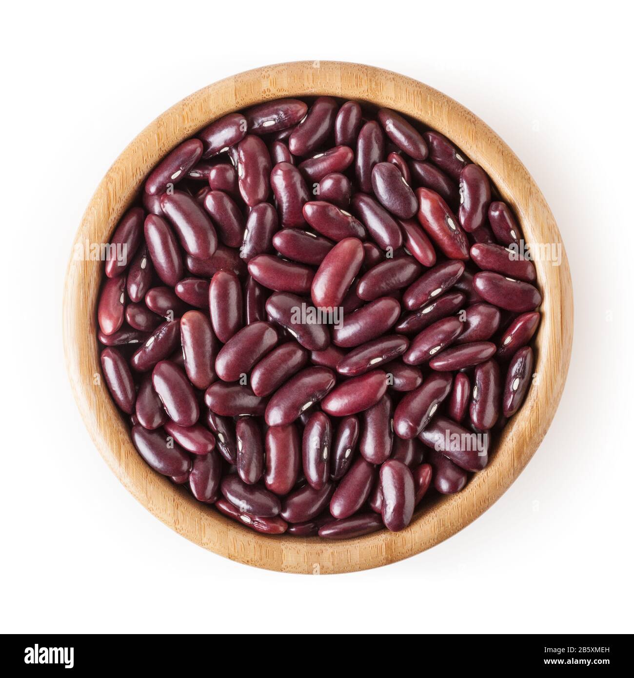 Uncooked red kidney beans in wooden bowl isolated on white background