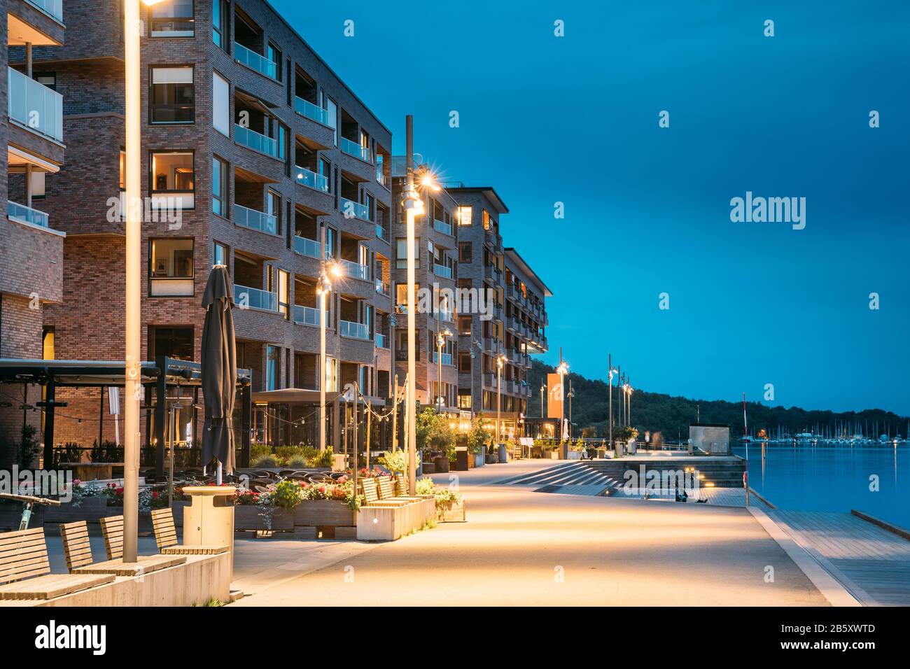 Oslo, Norway. Night View Embankment And Residential Multi-storey House On Sorengkaia Street In Gamle Oslo District. Residential Area In Summer Evening Stock Photo
