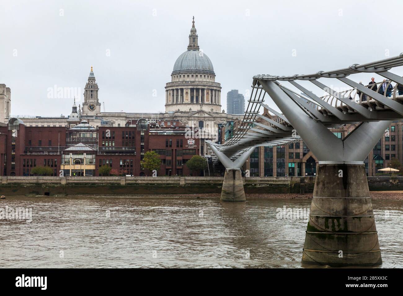 A foggy ,misty view over the The Millenium Bridge and St.Pauls Cathedral in London,England,UK Stock Photo