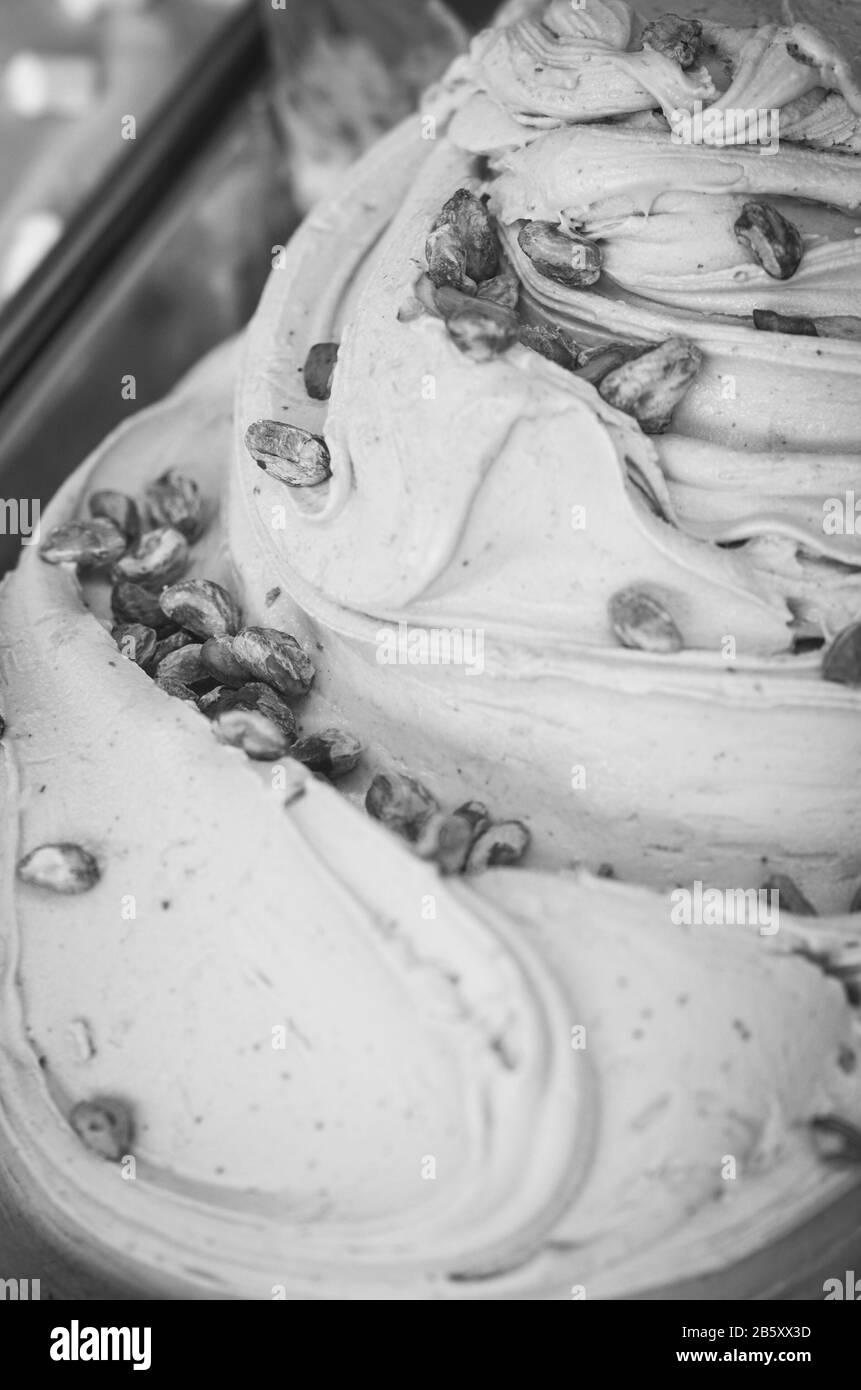 delicious italian ice cream with fresh fruits, nuts & topping Stock Photo