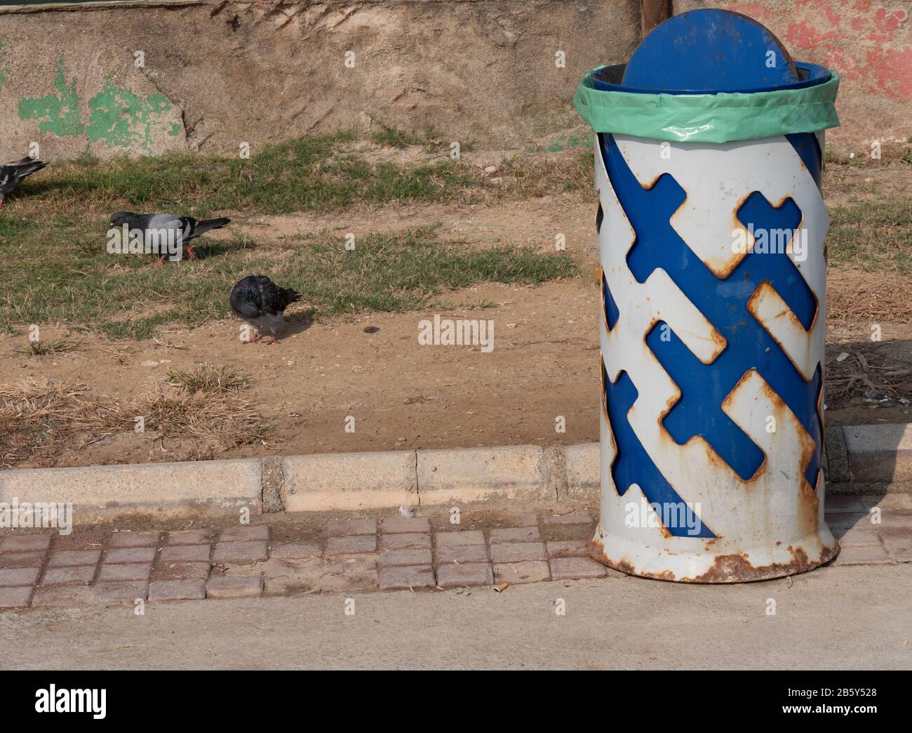 Rusty trash can at outdoor park Stock Photo Alamy