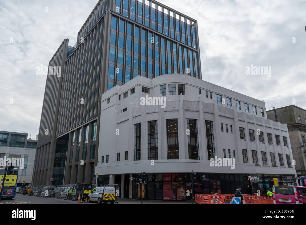 The old Odeon cinema on Renfield Street which has now been refurbished and converted into offices and restaurant space, behind is a new office block Stock Photo