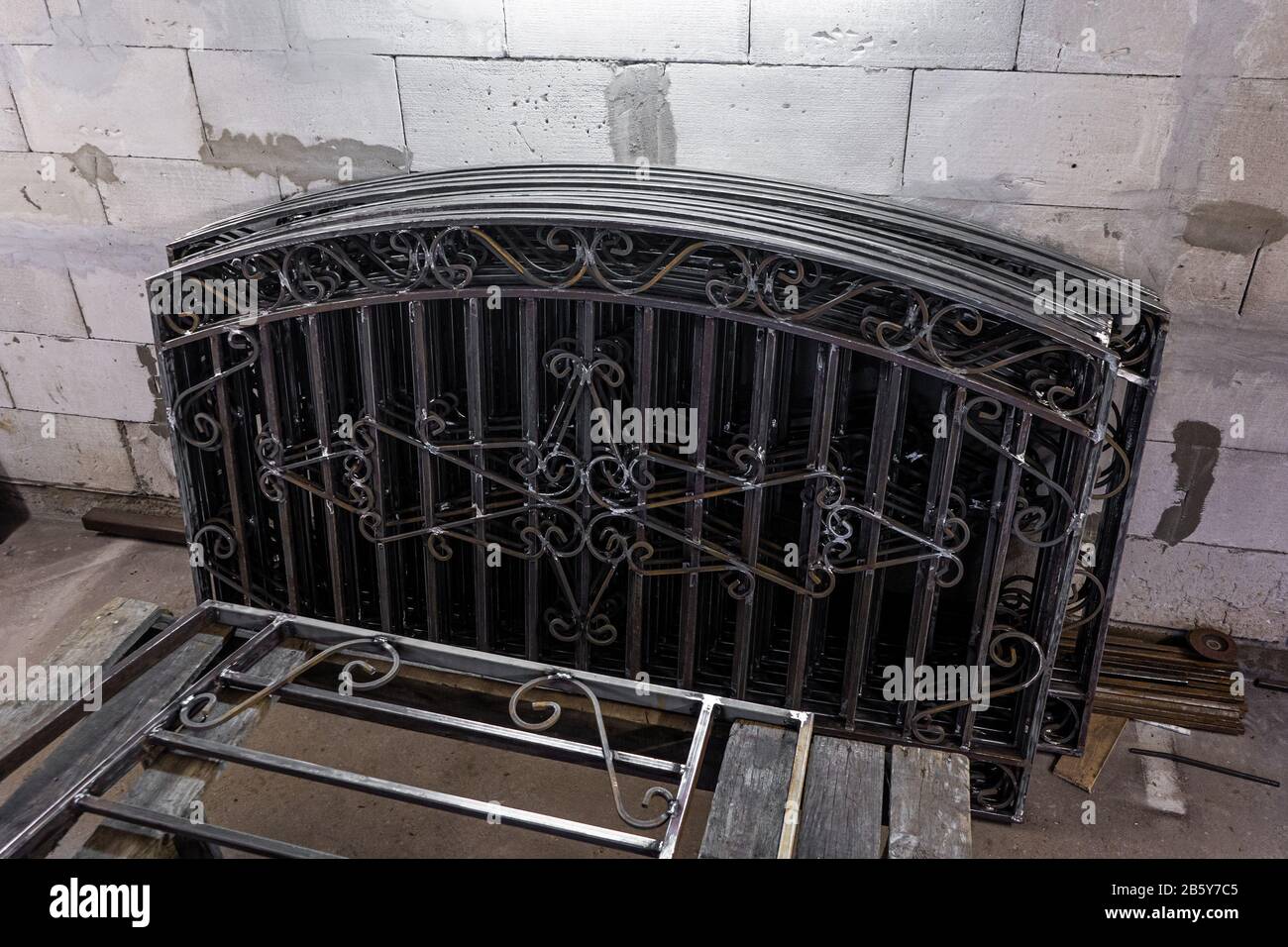 Metal Fance Rods part of a black metal fence made of steel rods with a forged Stock ...