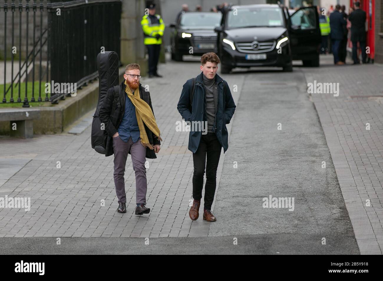 Padraig O’Dubhghaill & Conor Connolly leaving Tig Coili  Irish Music Pub in Galway after they played trad music for the Duke & Duchess of Cambridge Stock Photo