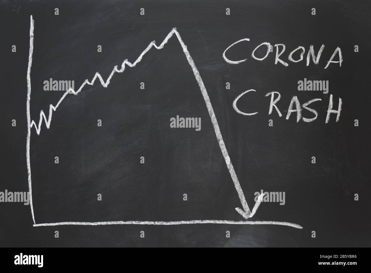 corona crash - hand-drawn graph on chalkboard showing stock market collapse or financial economy crisis caused by coronavirus Stock Photo
