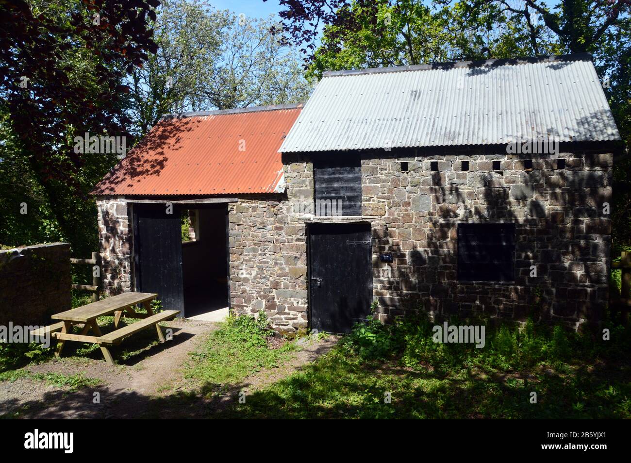 The National Trust's Old Peppercombe Coach house near Buck's Mills on the South West Coast Path, North Devon, UK. Stock Photo