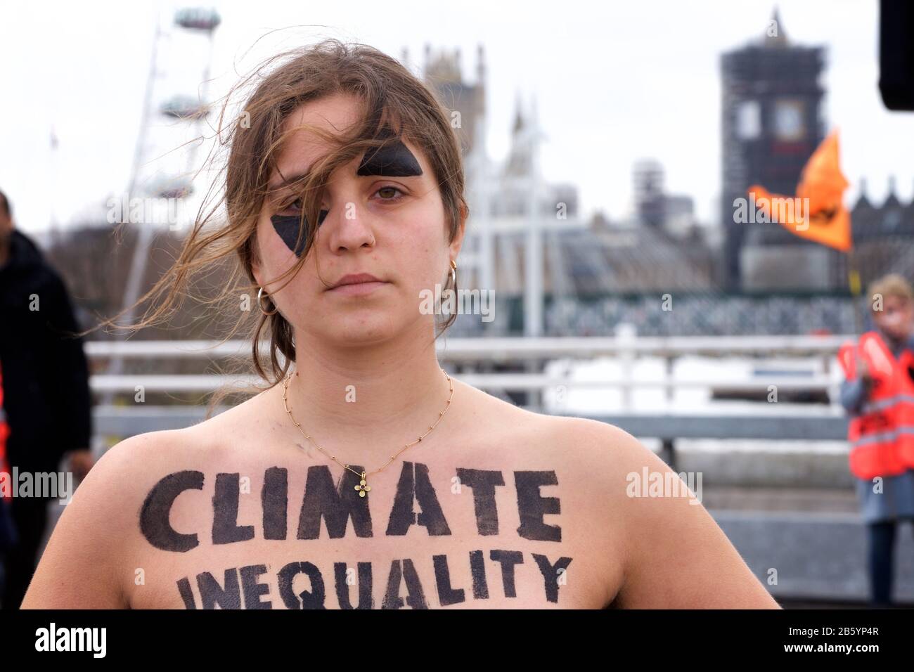 London, UK. 08th Mar, 2020. 08.03.20 - A group of 31 women formed a chain across Waterloo Bridge to "highlight the disproportionate impact of the climate and ecological emergency on women" Credit: Gareth Morris/Alamy Live News Stock Photo