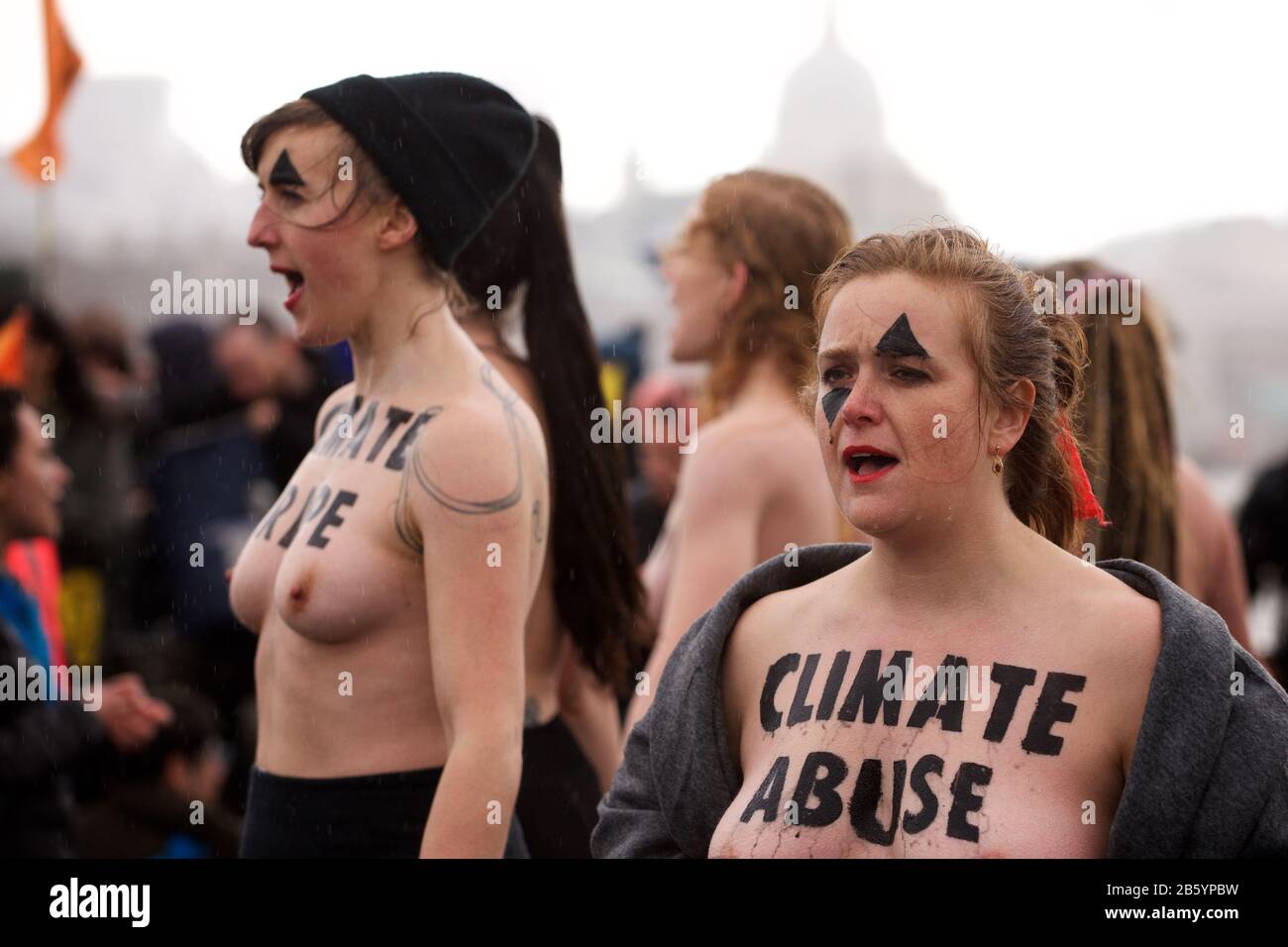 London, UK. 08th Mar, 2020. 08.03.20 - A group of 31 women formed a chain across Waterloo Bridge to "highlight the disproportionate impact of the climate and ecological emergency on women" Credit: Gareth Morris/Alamy Live News Stock Photo