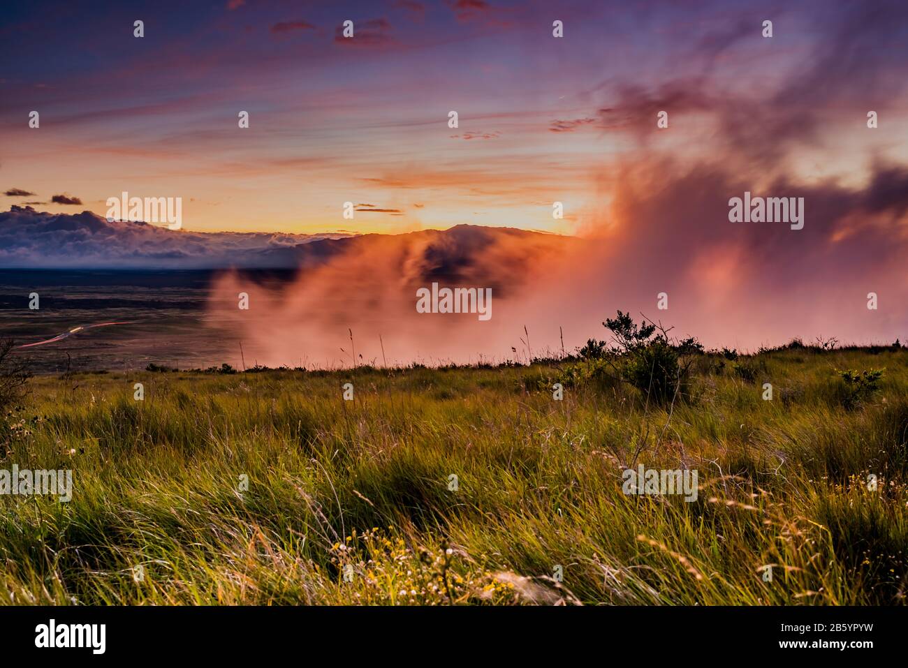 Smoke rising from a sleeping dormant volcano in Hawaii Volcanoes