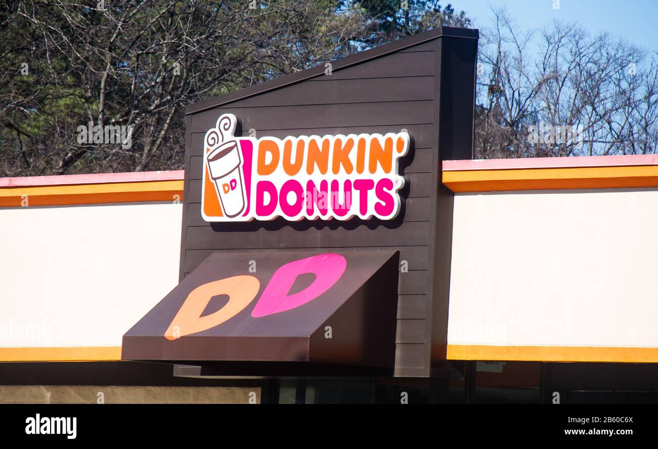 DUNWOODY, GEORGIA- January 5, 2012: Dunkin' Donuts is an American multinational coffeehouse and donut company. It was founded by William Rosenberg in Stock Photo