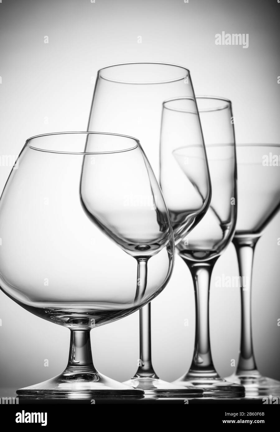 A variety of empty glasses for alcoholic beverages. Close up Stock Photo