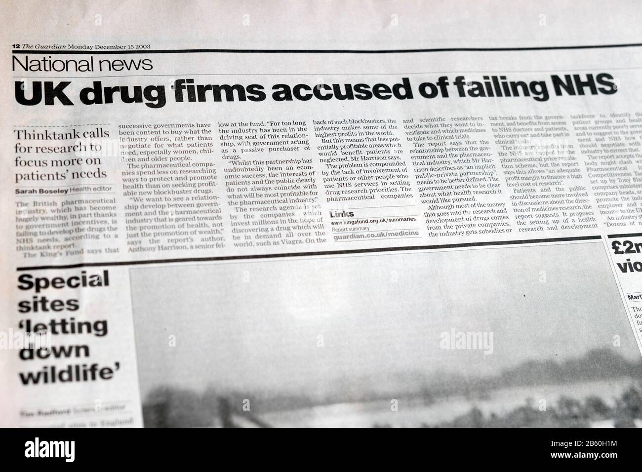 'UK drug firms accused of failing NHS' inside page National section Guardian newspaper headline on 15 December 2003 London England UIK Stock Photo