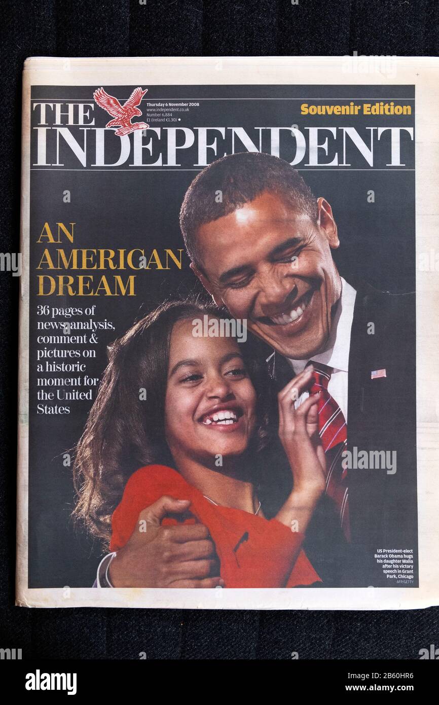 President Barack Obama hugs his daughter Malia on the front page headline souvenir edition of The Independent newspaper London UK 6 November 2008 Stock Photo