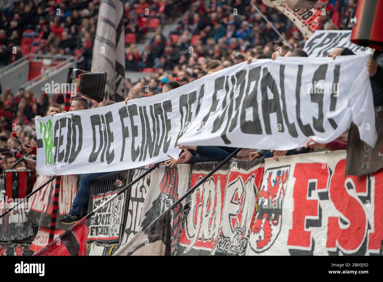 Leverkusen fans hold banners with the inscription: "You are the enemies of  football!", Fan, fans, spectators, supporters, supporters, ultra, ultras,  protest, football 1. Bundesliga, 25th matchday, Bayer 04 Leverkusen (LEV) -  Eintracht