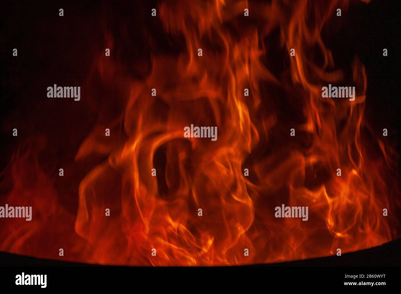 Texture of fire. Orange bright flame. Photo of a burning bonfire in a