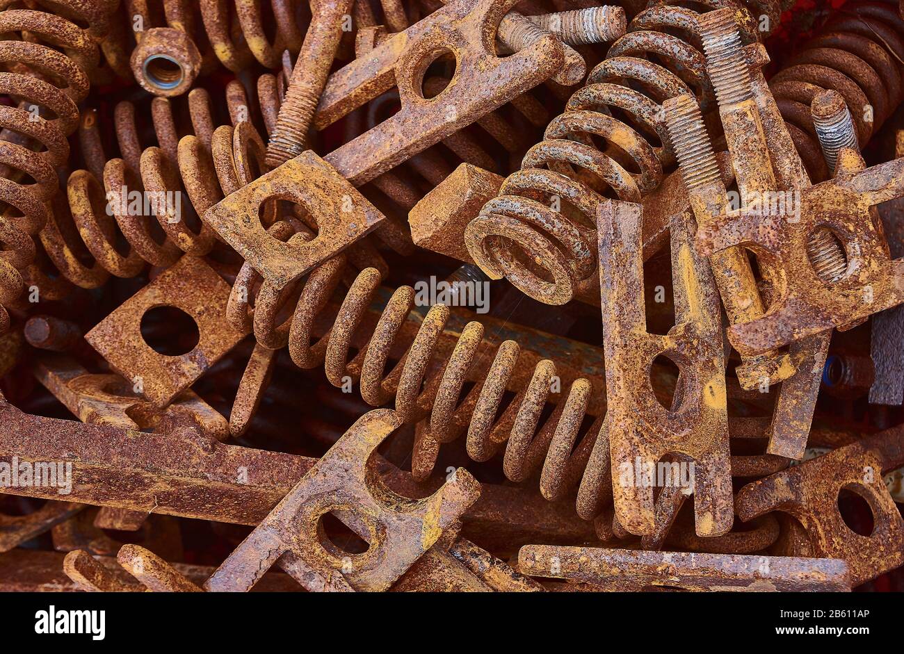 Rustiny brown and yellow springs and metal Stock Photo - Alamy