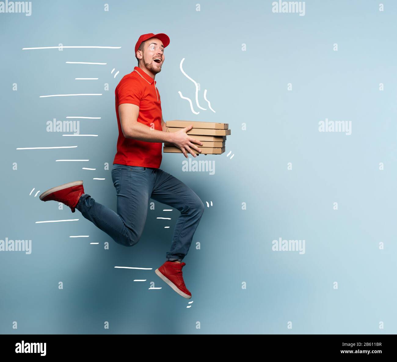 Courier runs fast to deliver quickly pizzas. Cyan background Stock Photo