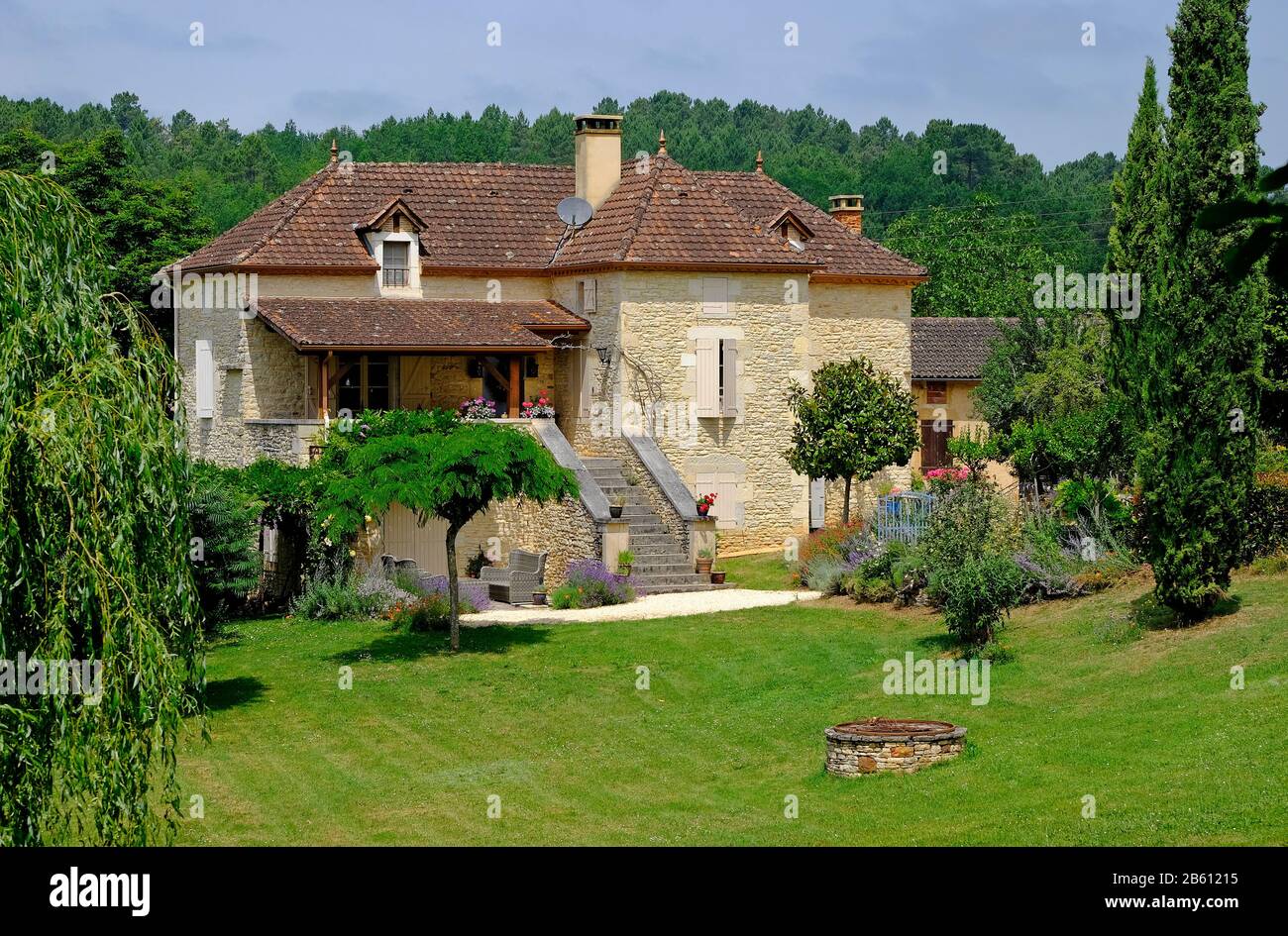 house and garden in the lot valley region of france Stock Photo