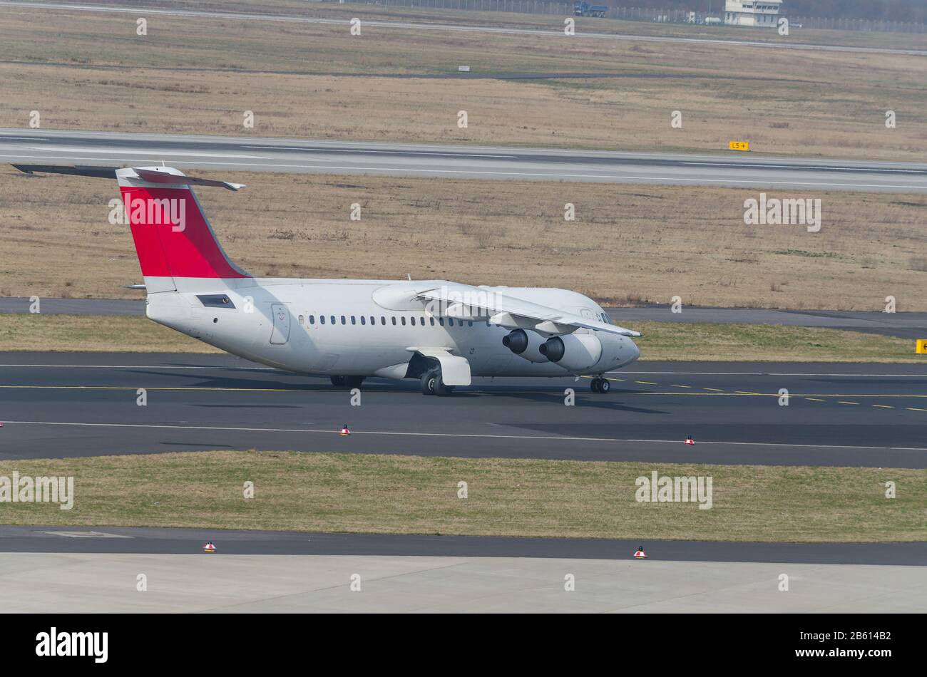 Dusseldorf, Nrw, Germany - March 18, 2015: A passenger plane on the runway of an airport start Stock Photo