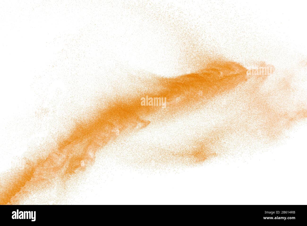 Orange powder dust particles explosion on white background.Orange dust