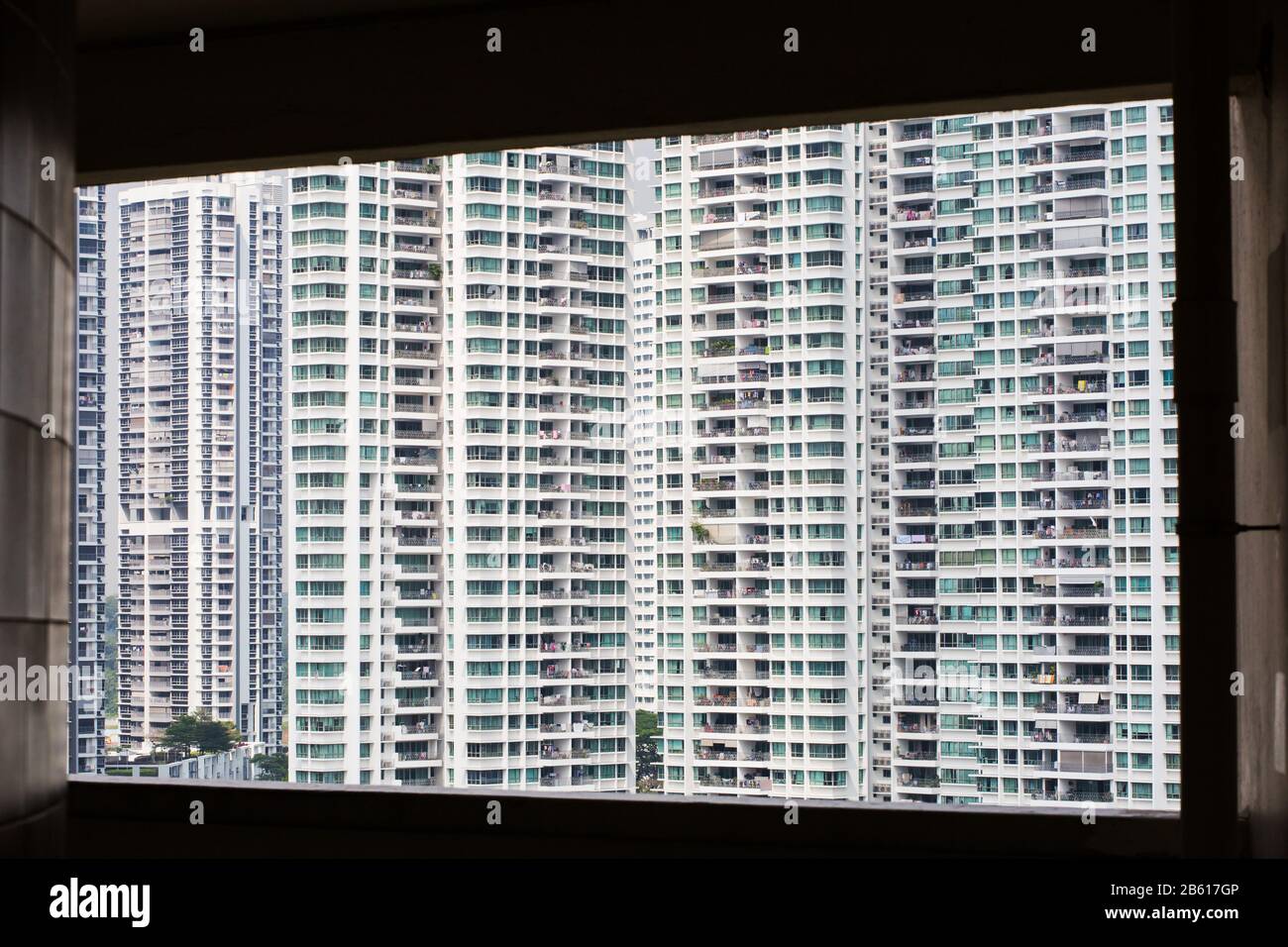 View of condominium apartments through the window, Singapore Stock Photo
