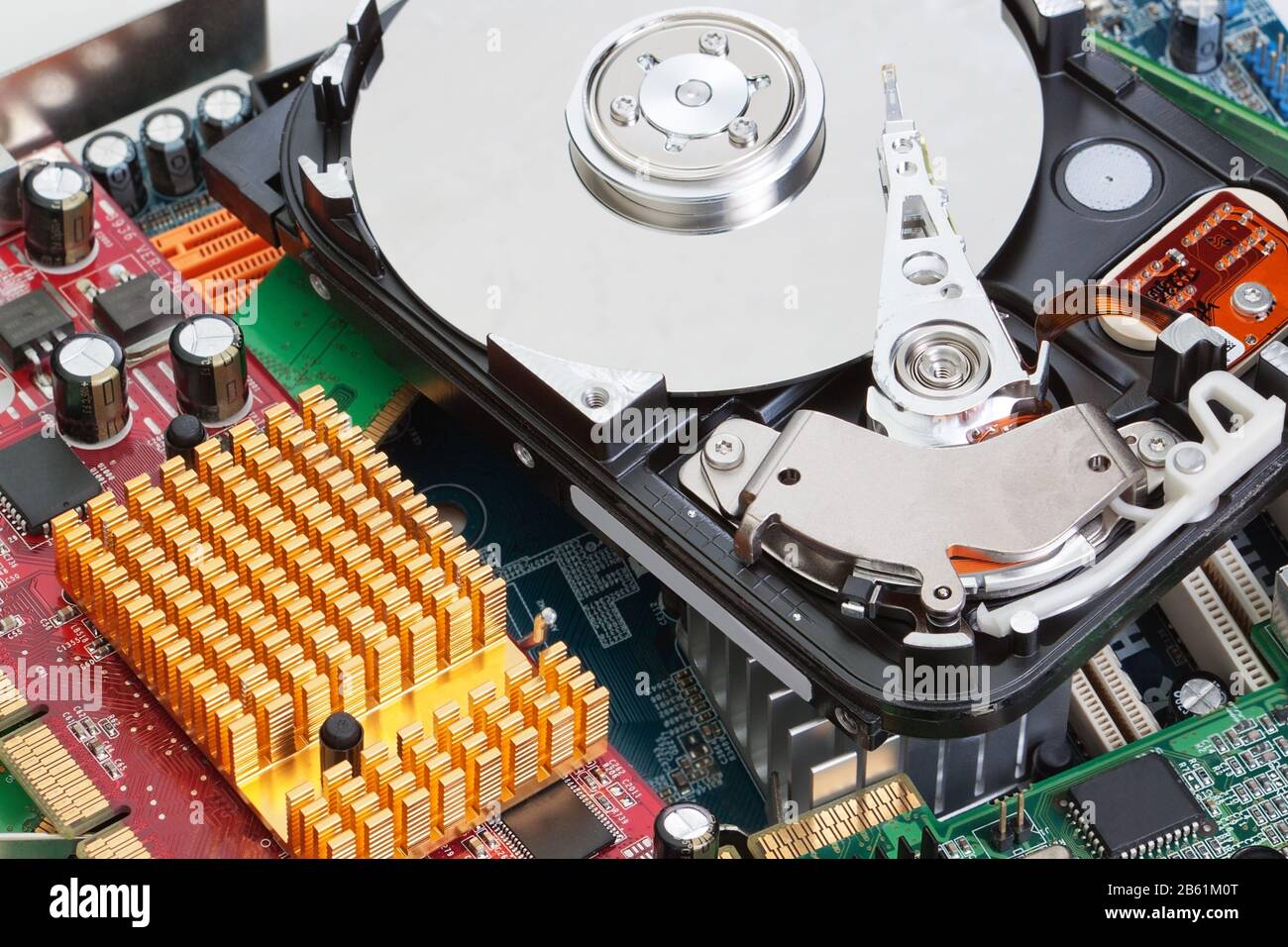 A pile of computer parts motherboard hard drive. Close-up. Stock Photo