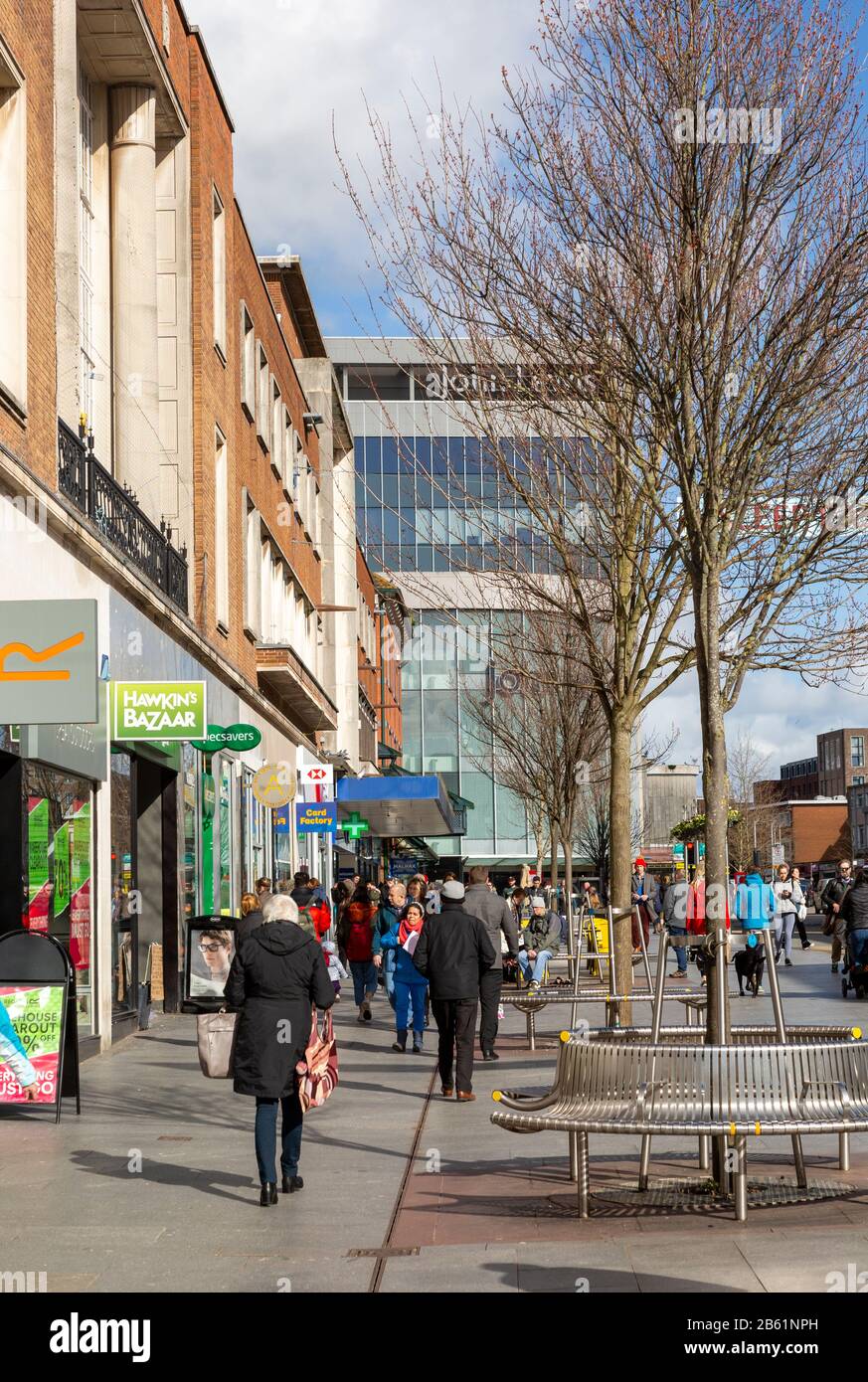 John Lewis store and shoppers in High Street, Exeter, Devon, England