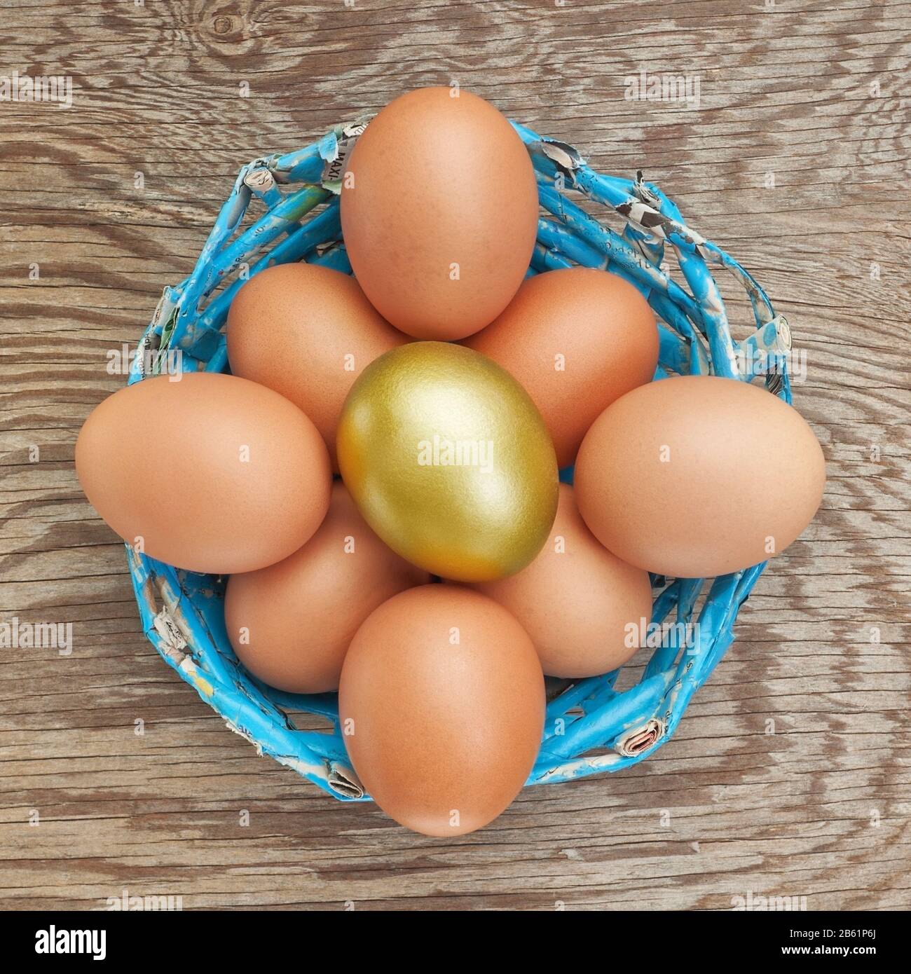 Group Of Eggs In A Basket Blue And Golden Egg At Easter Stock Photo Alamy