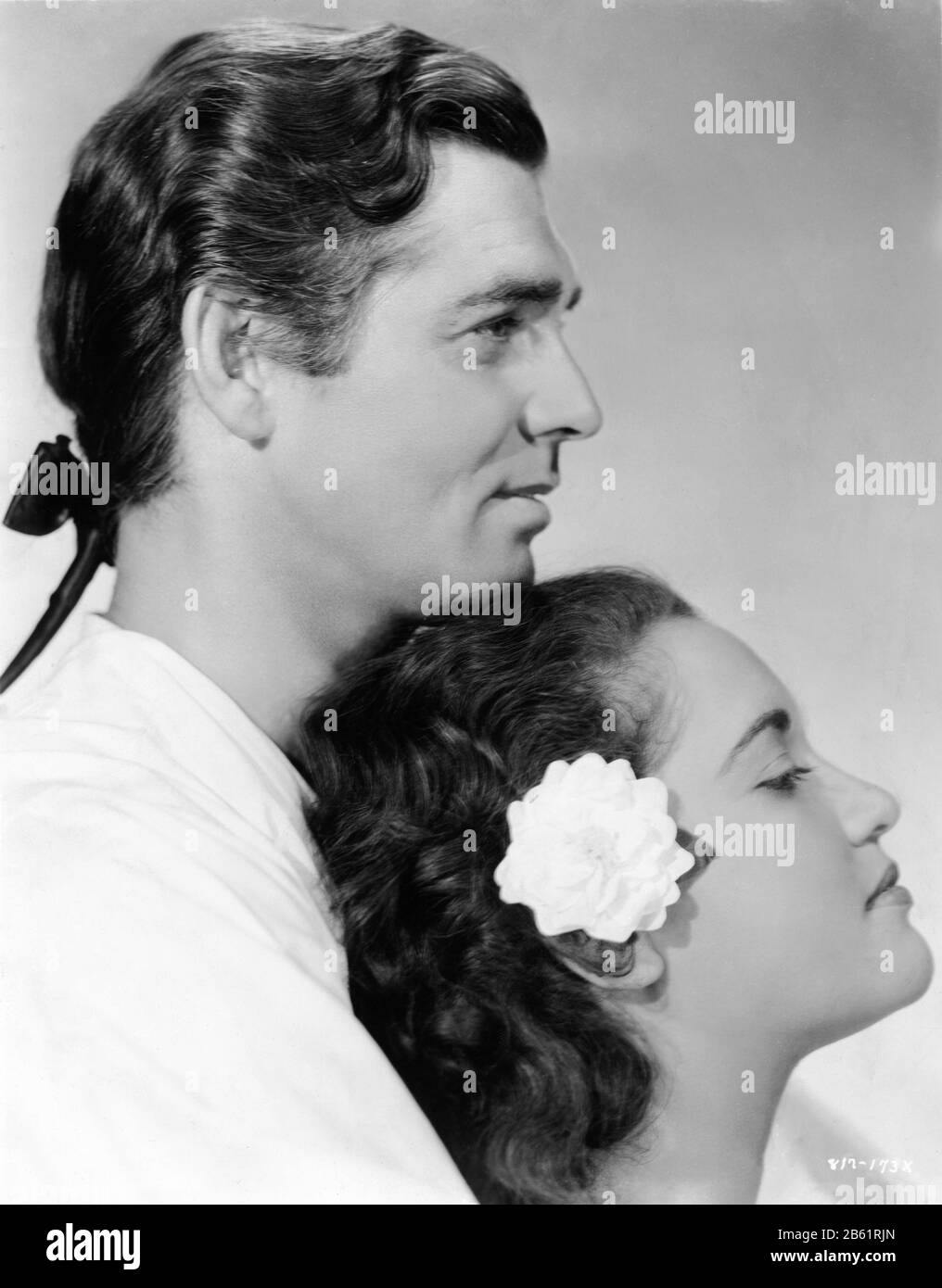 CLARK GABLE as Fletcher Christian and MAMO CLARK as Maimiti Posed Publicity Portrait for MUTINY