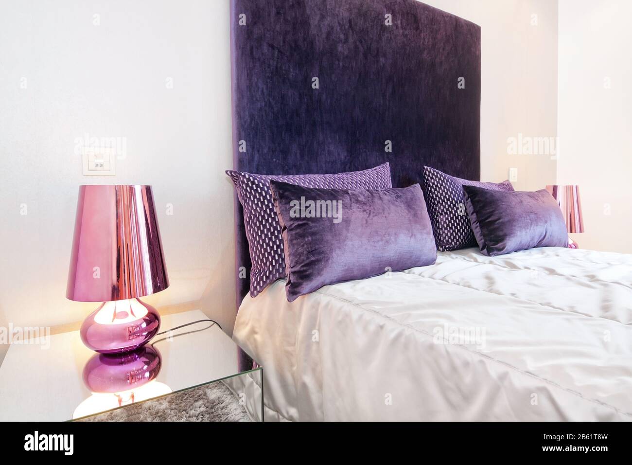 Downlights lamps in the bedroom beside the bed Stock Photo Alamy