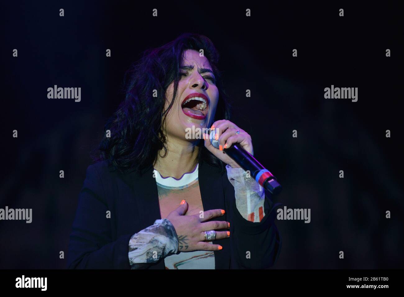 Chilean singer Ana Tijoux performs live on stage during the Tiempo de Mujeres Music Festival at Zocalo in Mexico City. Stock Photo