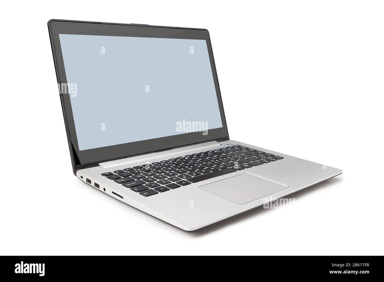 Modern laptop side and open on a white background. Stock Photo