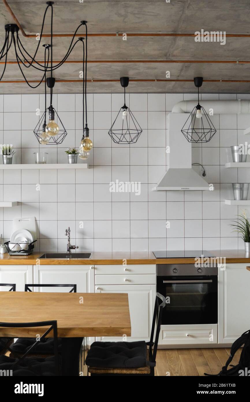 Modern, bright, clean, kitchen interior with stainless steel appliances ...