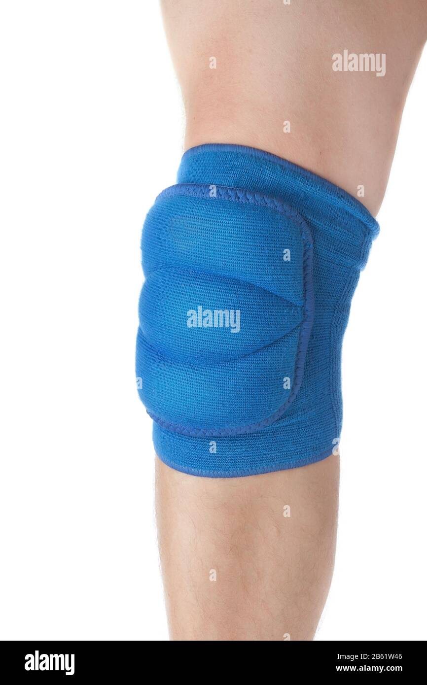 Knee protection in games on the male leg. Close-up. On a white background. Stock Photo