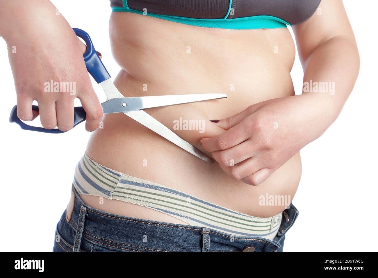 Fat woman trying to get rid of excess fat and completeness. Stock Photo