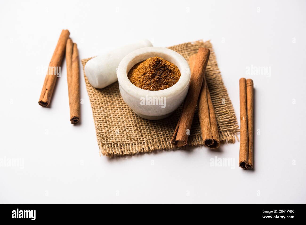 Powder cinnamon and sticks also known as Dalchini or Dalcheenee masala from India, selective focus Stock Photo