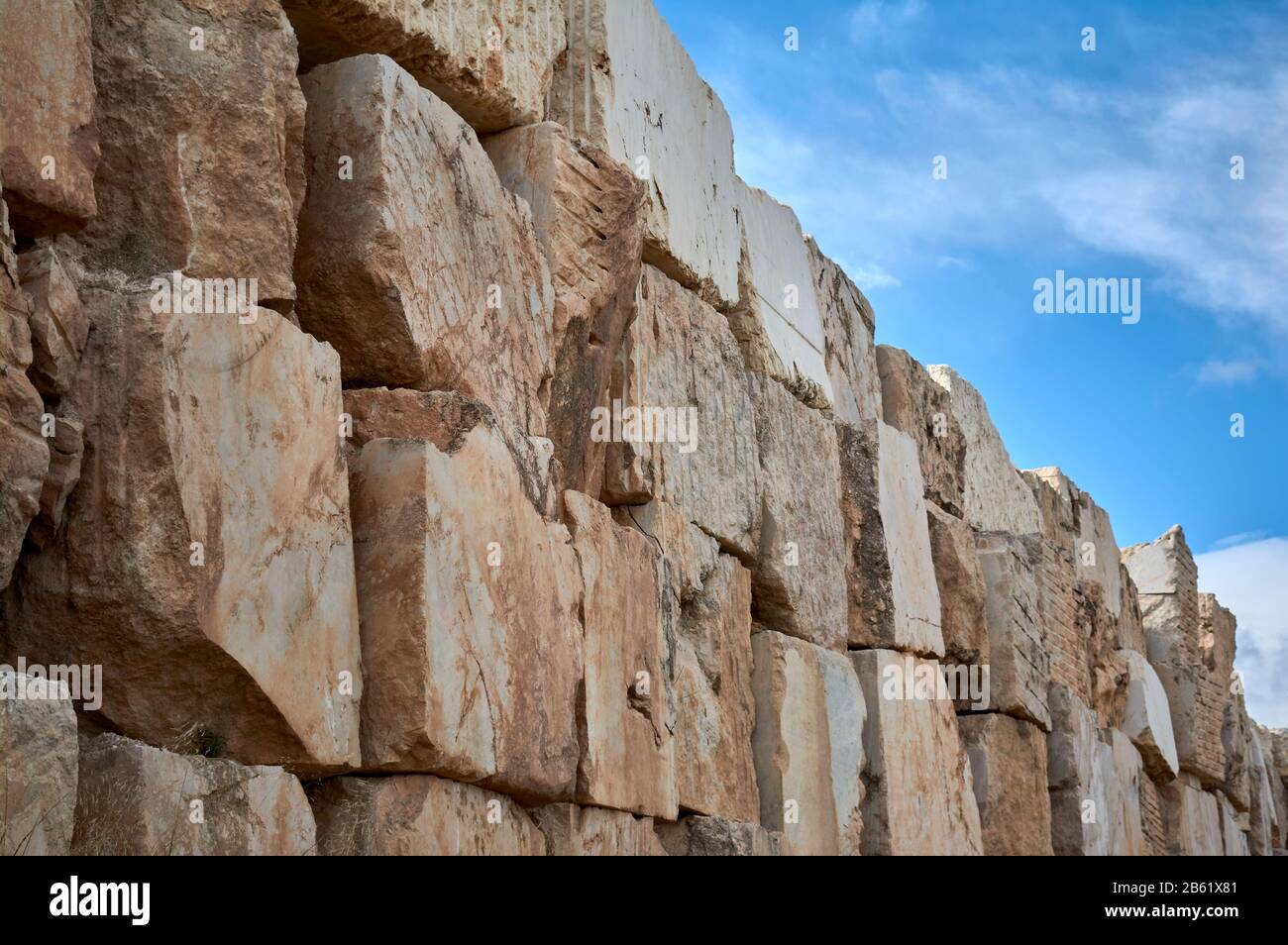 detail of a part of a wall of marble stones cut and abandoned in a quarry Stock Photo