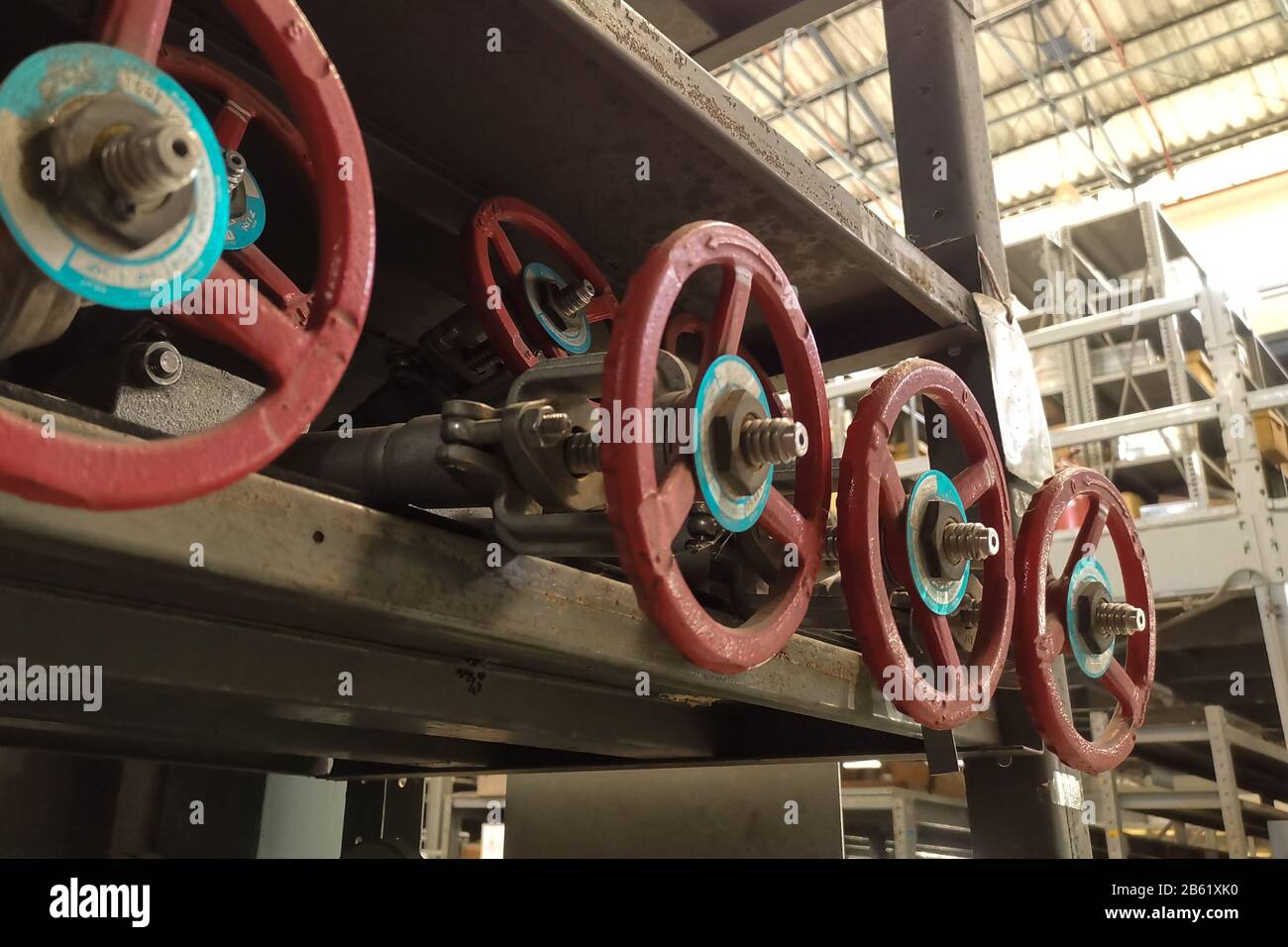 Heavy industry metal gate valve on inventory spare shelf for emergency ...