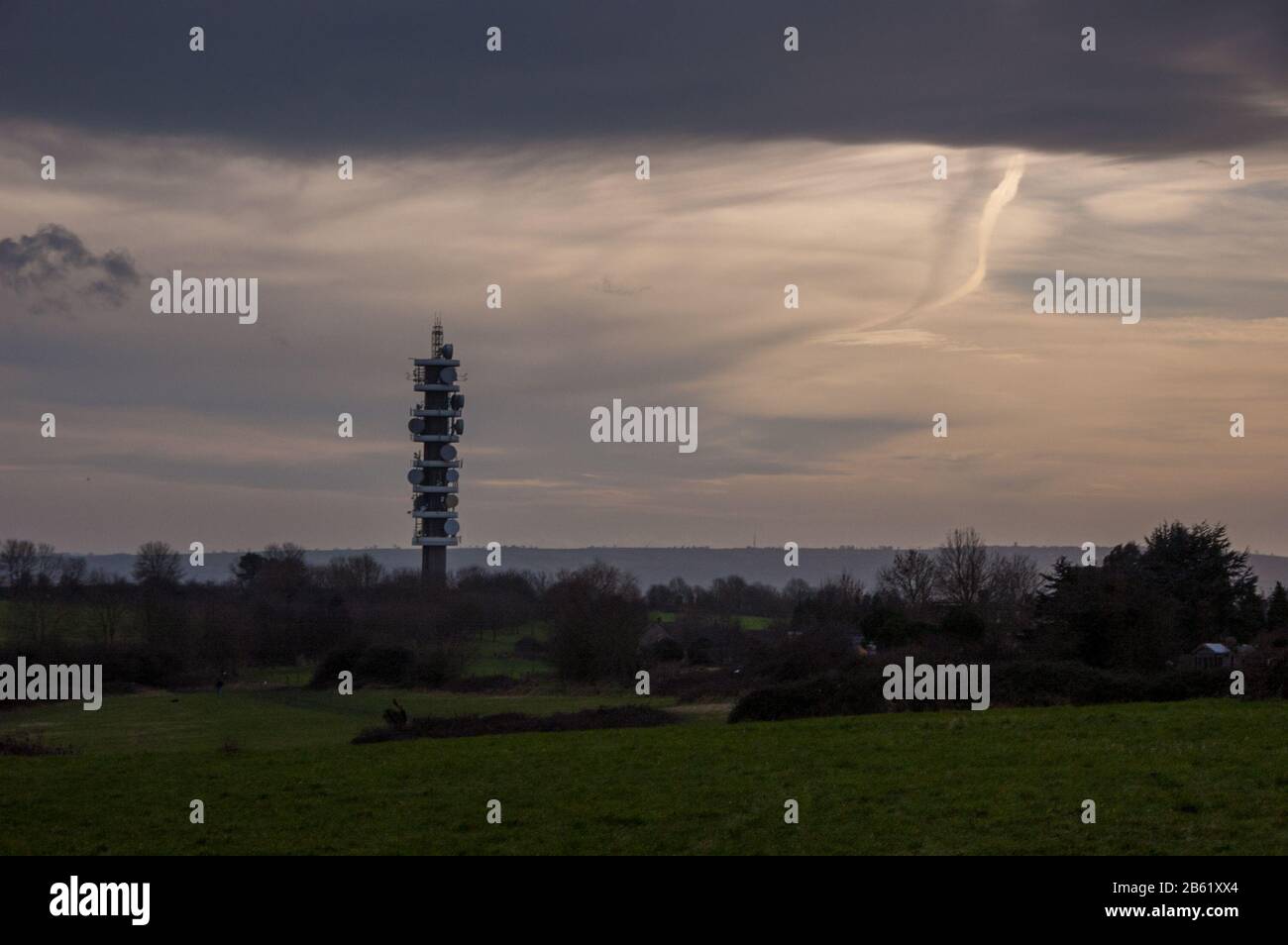 The Purdown BT microwave network transmitter rises from parkland in the Lockleaze neighbourhood of North Bristol. Stock Photo